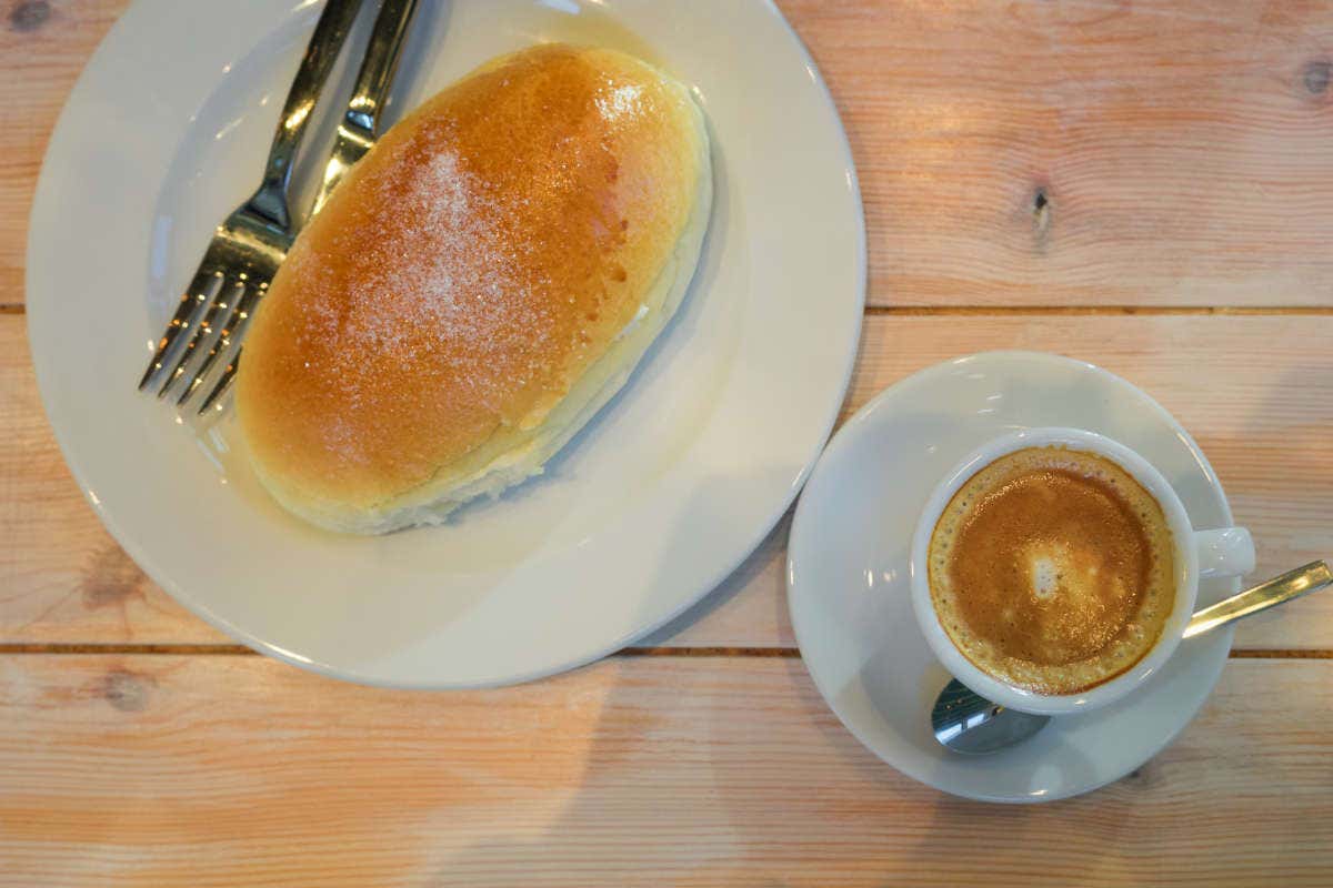 A Bilbao butter bun and a coffee