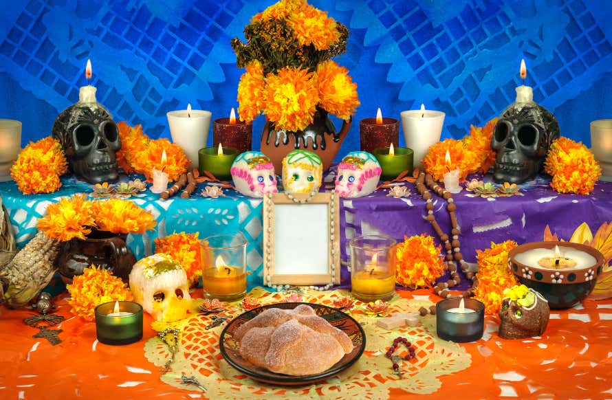 Altar with candles, skulls and flowers for Day of the Dead in Mexico