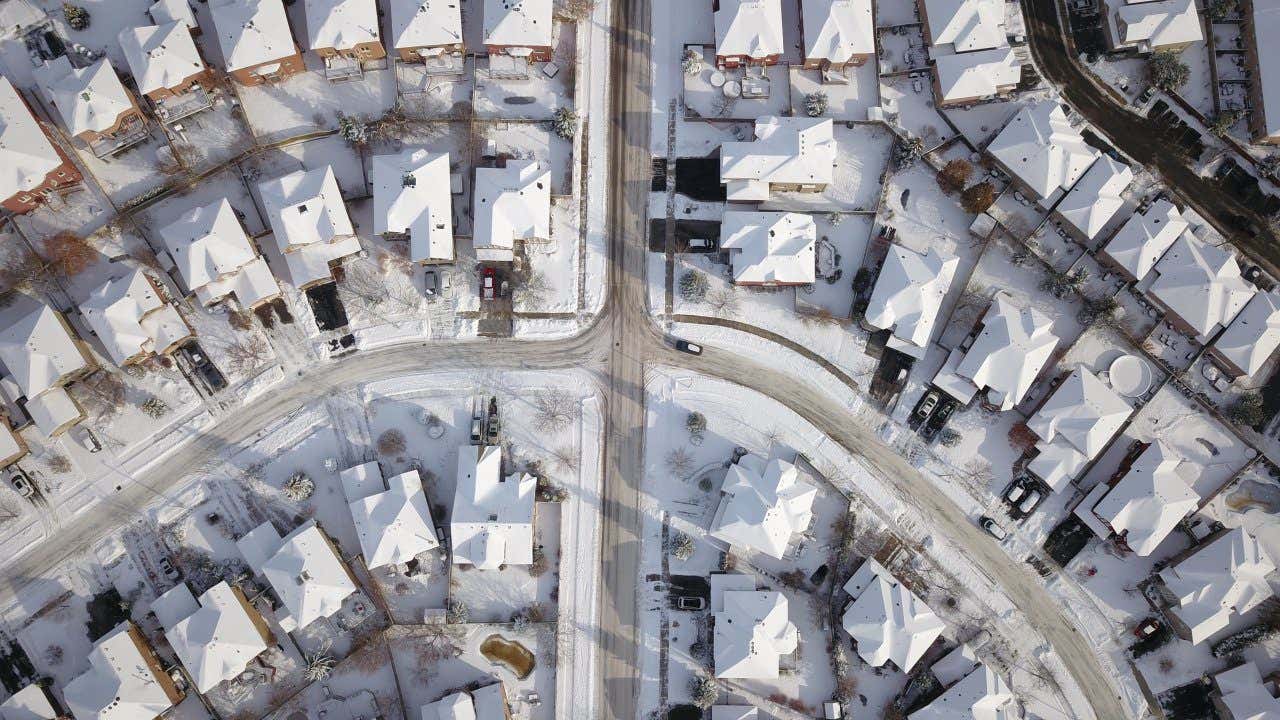 Areil view of snow covered houses and streets in Oakville Canada