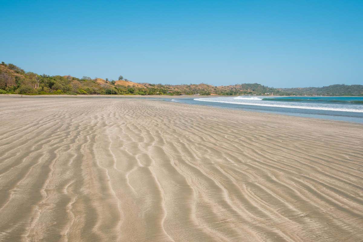 Spiaggia Venao e il suo vasto arenile dorato, sullo sfondo il mare leggermente mosso