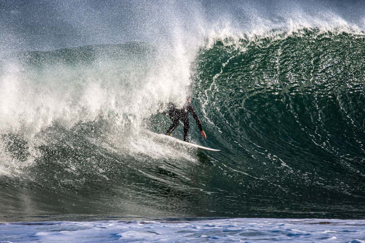 Somebody surfing a huge wave in the Basque town of Mundaka.