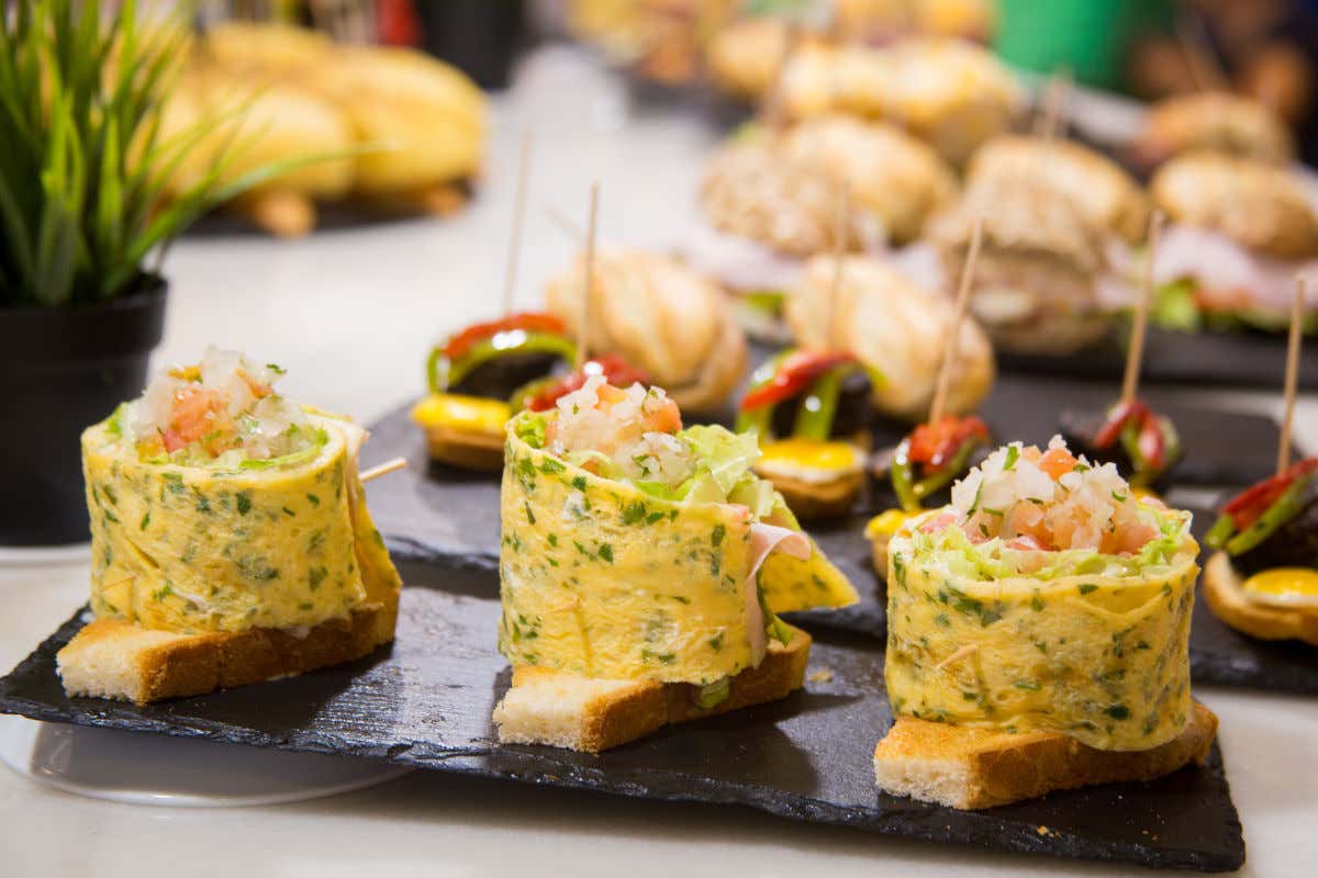 Small plates with various pintxos of the Basque Country.