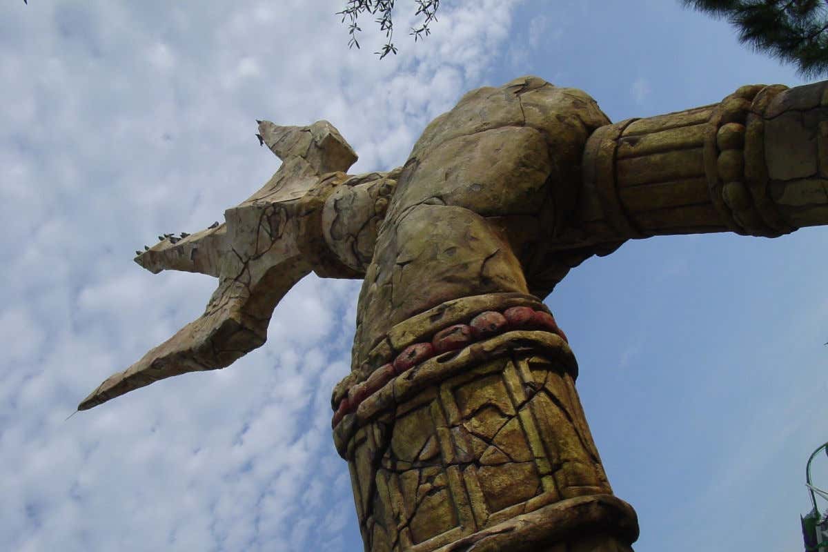 A gigantic stone trident as a decorative element at an Orlando amusement park