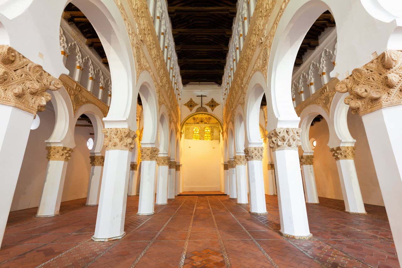 Horseshoe arches and pillars inside the synagogue of Santa María la Blanca.