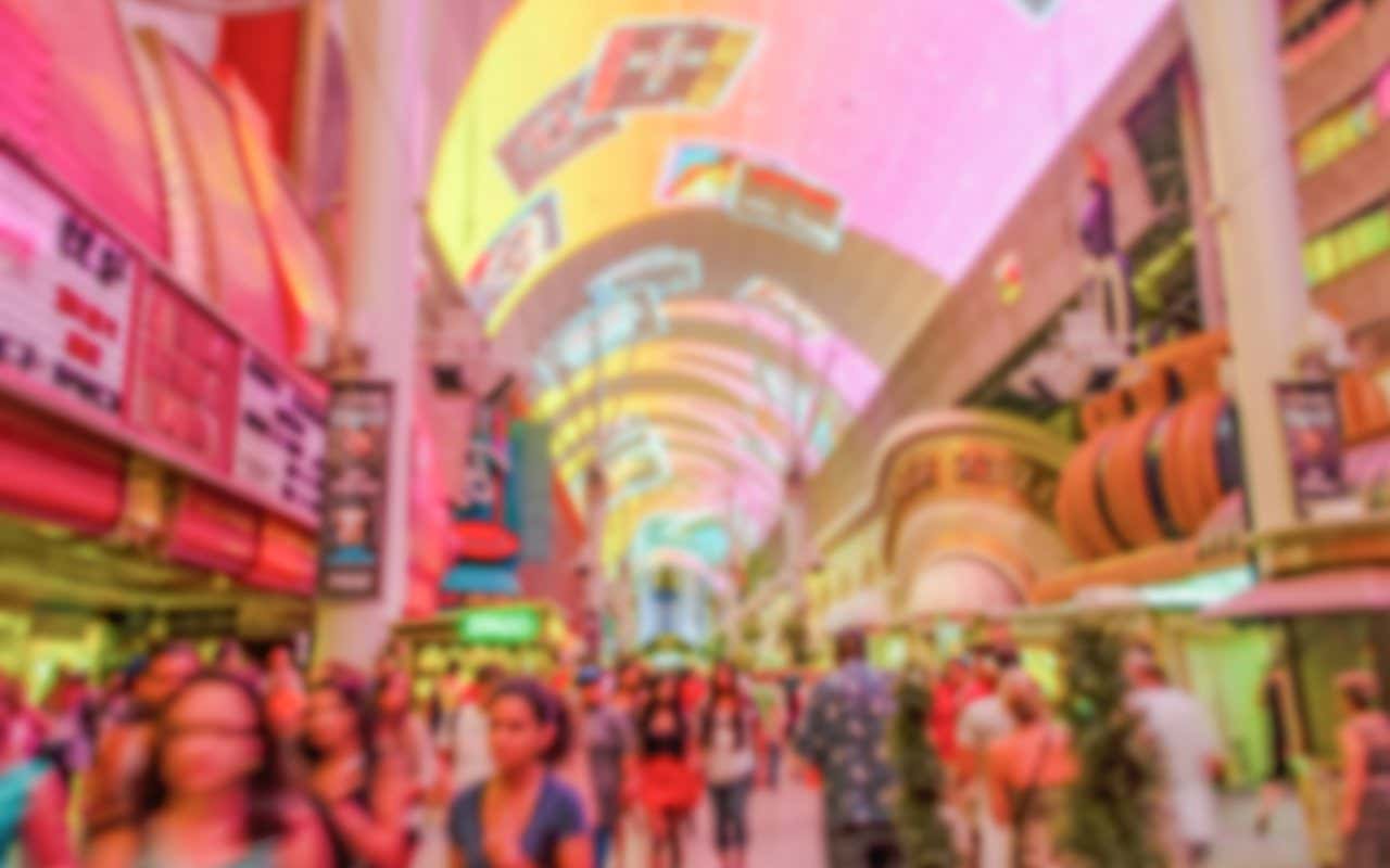 Passers-by under the Fremont Street screens