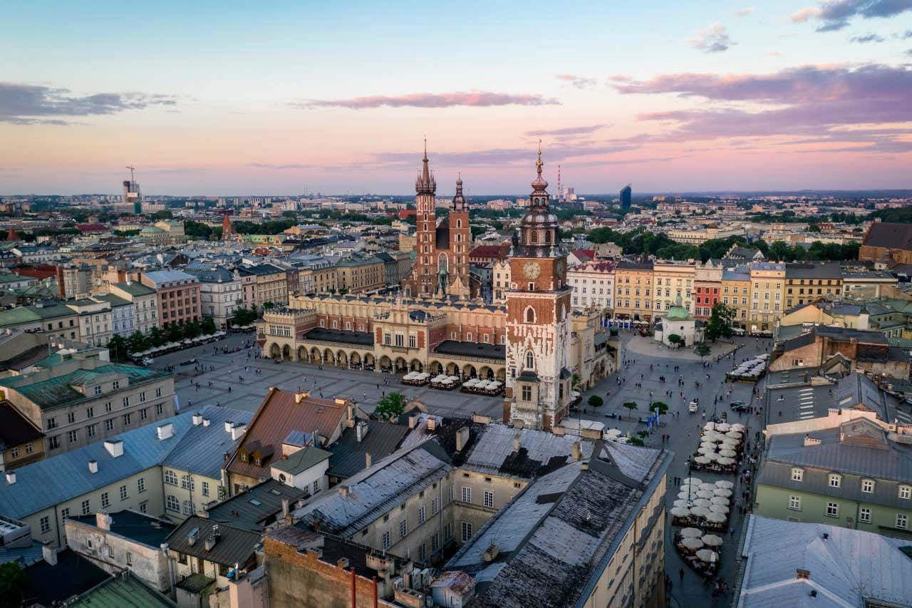 Główny Rynek (Main Market Square) as seen from above with a pinkish sky in the background.