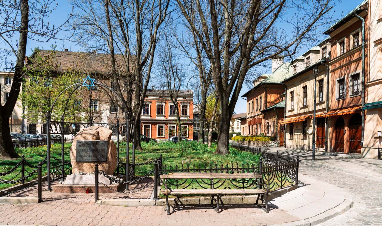 A bench alongside a rock in the Jewish Town of Kazmierz in Krakow.