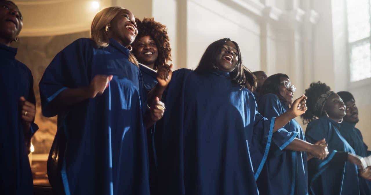 Femmes afro-américaines chantant lors d'une messe gospel à New York