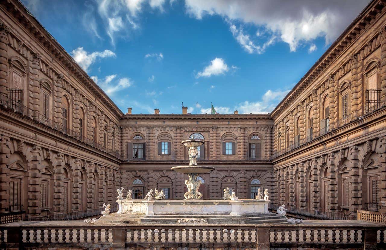 Um fonte na parte de trás do Palazzo Pitti em um dia ensolarado