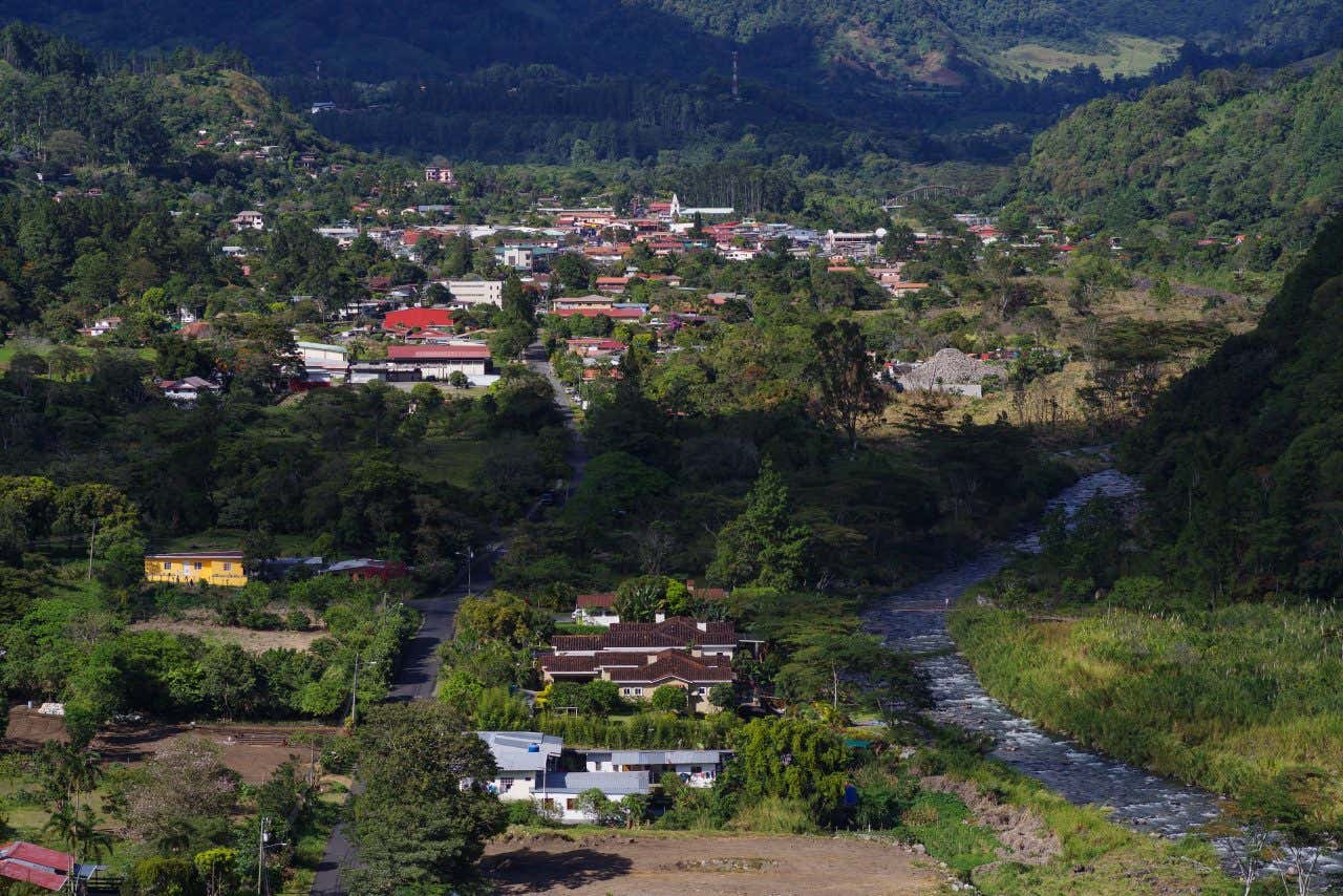 Boquete as seen from above, with lots of green vegetation and housing in view.