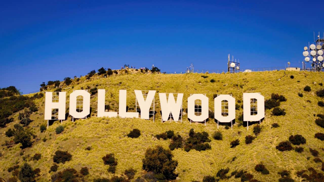 Views of the Hollywood sign on the side of a mountain