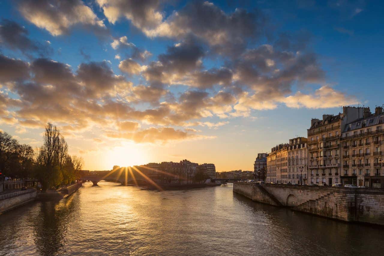 Île Saint-Louis seen from further down the River Seine as the sun set.