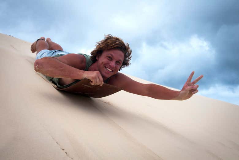 Sand tobogganing