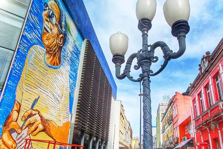 Visit 12 murals that reflect the city's culture