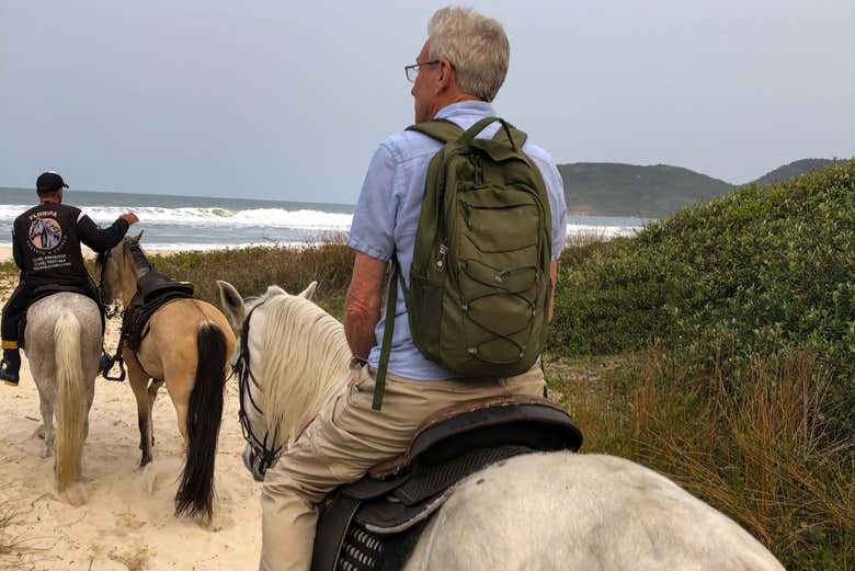 Enjoy the sound of the waves crashing on the sand