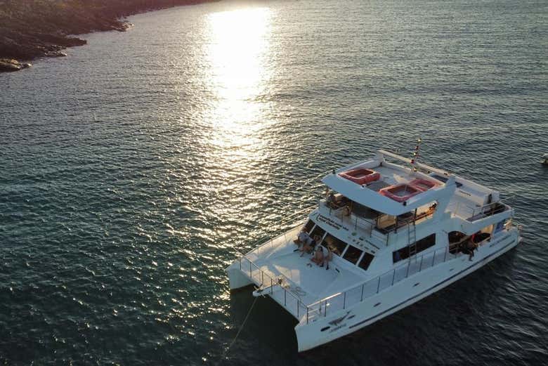 Set sail towards the Abrolhos Islands on a catamaran