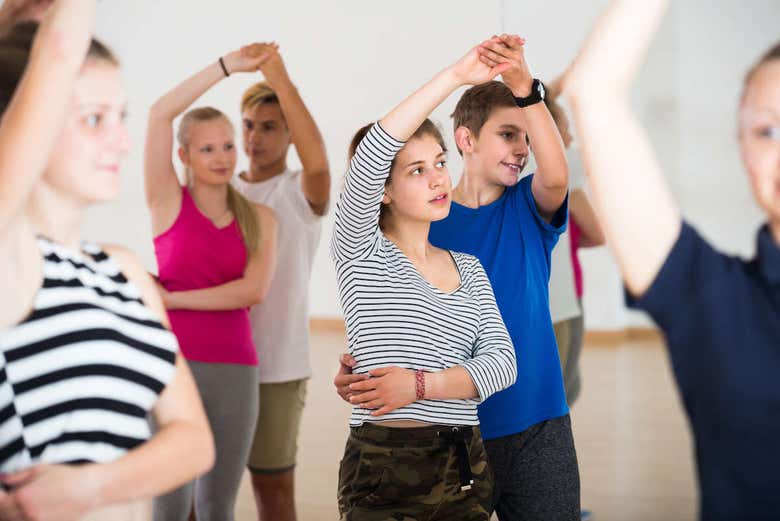 Children learning salsa