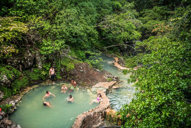 Enjoy a bath in the hot springs of Río Negro