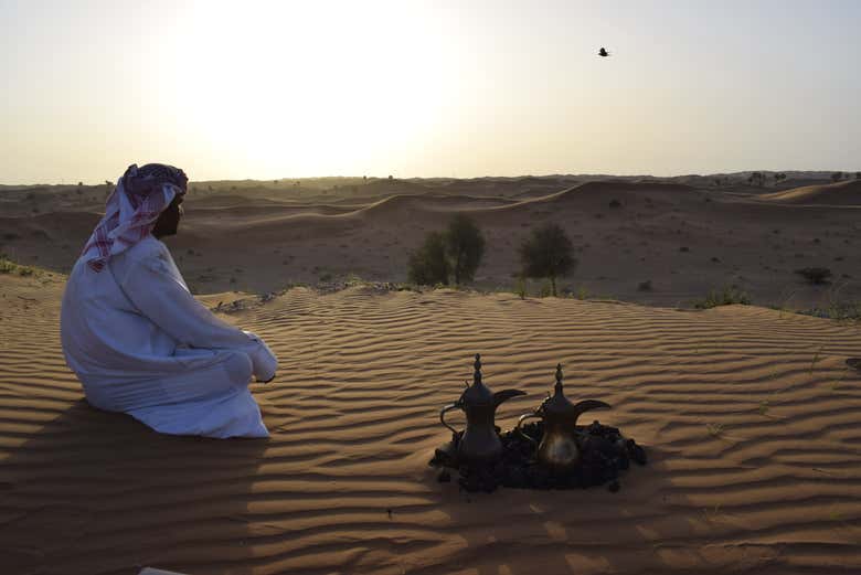 Admiring the sunset from the desert camp