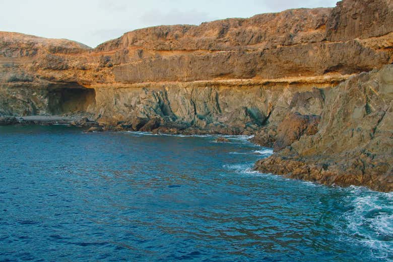 Visit sea caves on the western coast of Fuerteventura