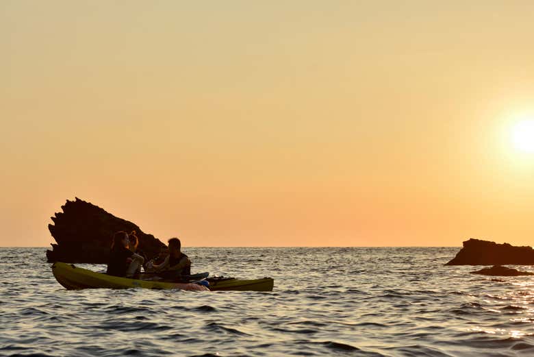 Kayak into the setting sun