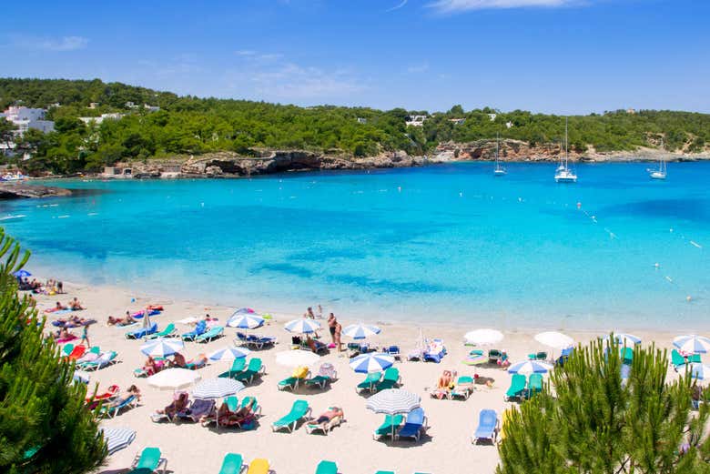 Take in the bright Spanish sun at Portinatx Beach