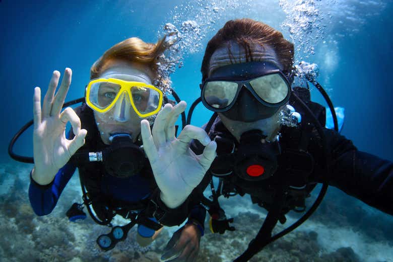 Two people giving the OK hand signal