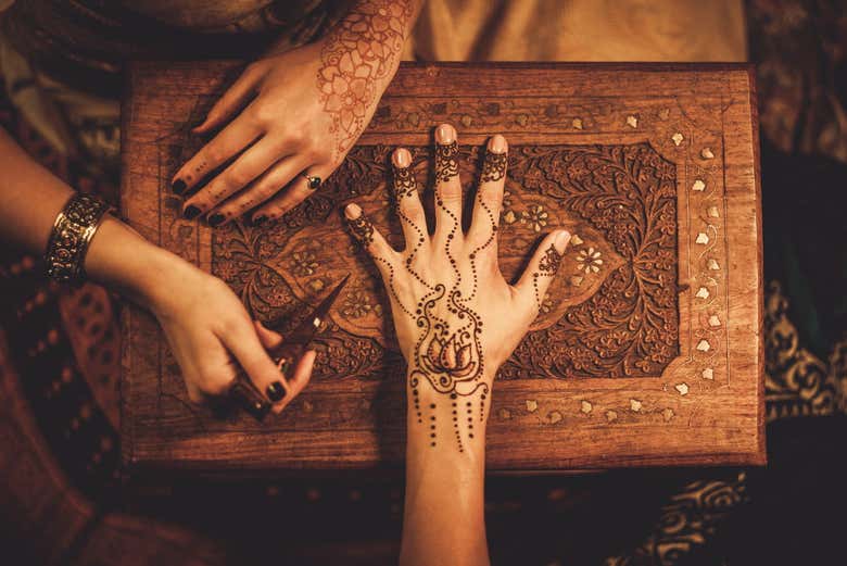 Henna decoration on the hand of the bride