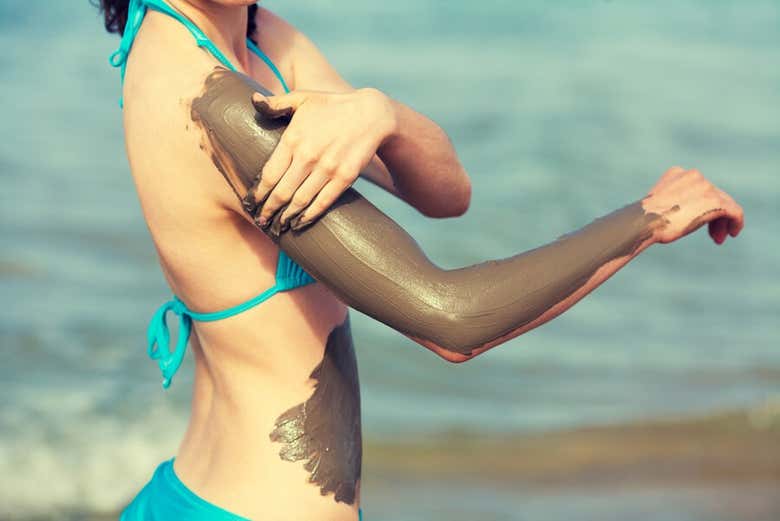 Exfoliate your skin with mud from the Dead Sea!