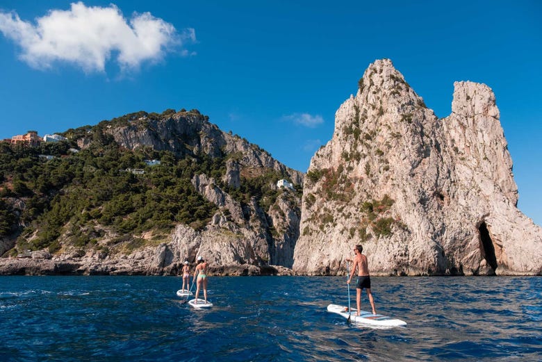 Paddleboarding along the coast of Capri