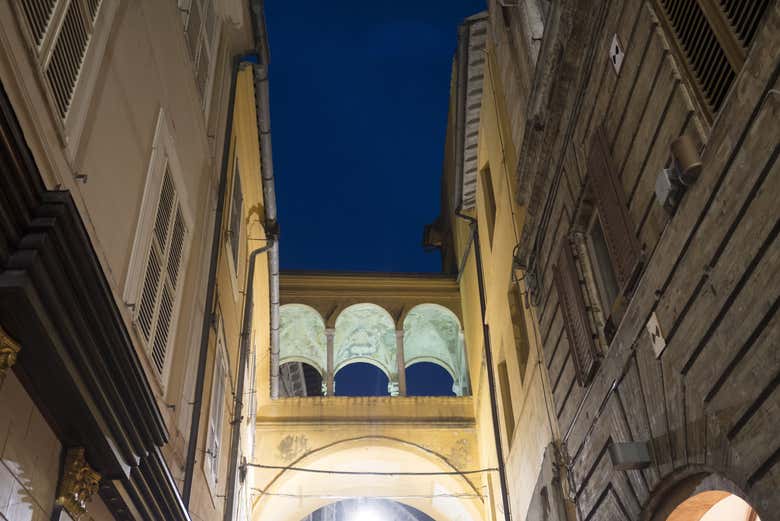 Fermo's buildings lit up at night