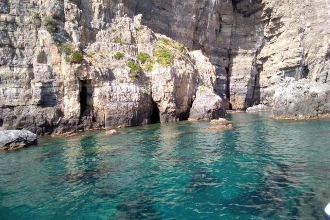 Touring the caves along the Bay of Infreschi