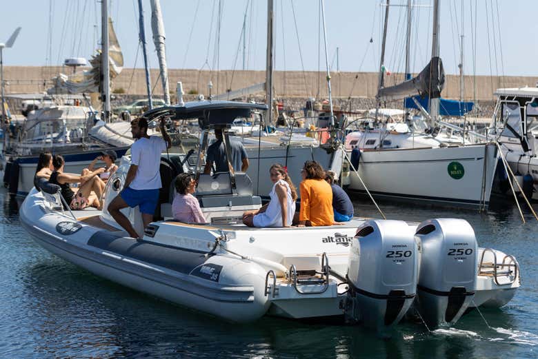 Sail along the coastline on a boat