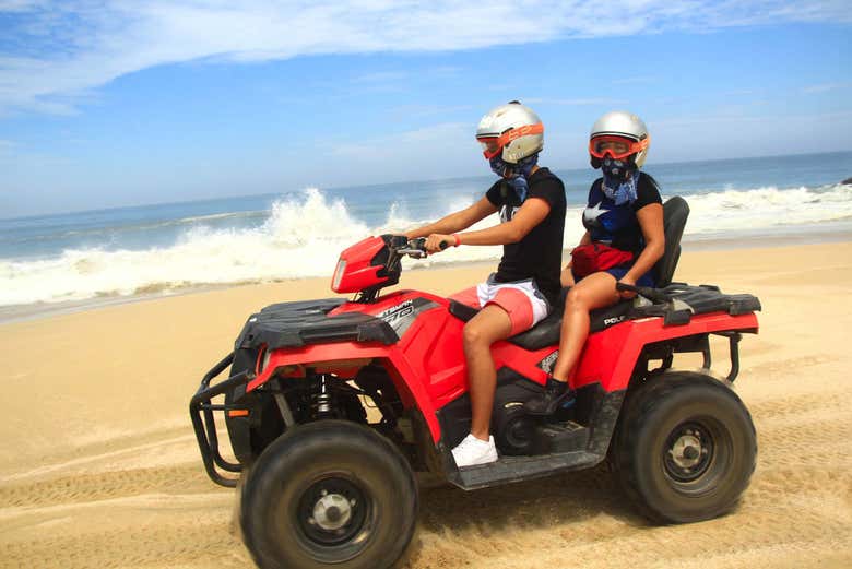 Exploring Migriño Beach on quad bikes