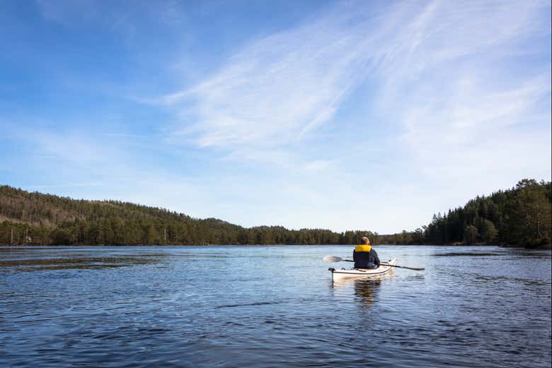 Paddle across the tranquil waters of Amla Bay