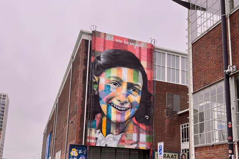 See the famous mural of Anne Frank