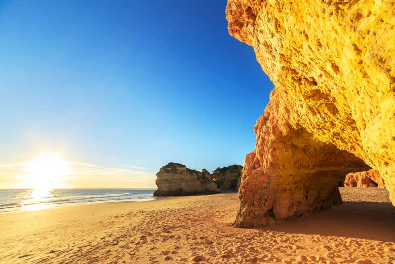 Admire a sunset in the Algarve