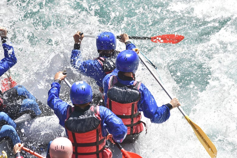 Get an adrenaline river rafting in Switzerland