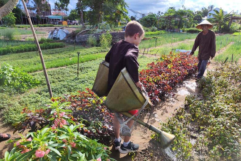 Watering crops in Tra Que